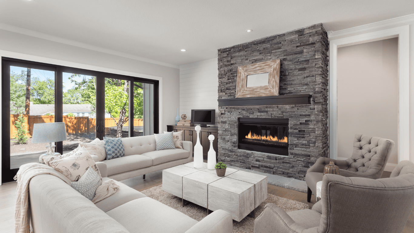 Modern Living Room with Stone Fireplace Contemporary living room featuring a sleek stone fireplace and large windows.